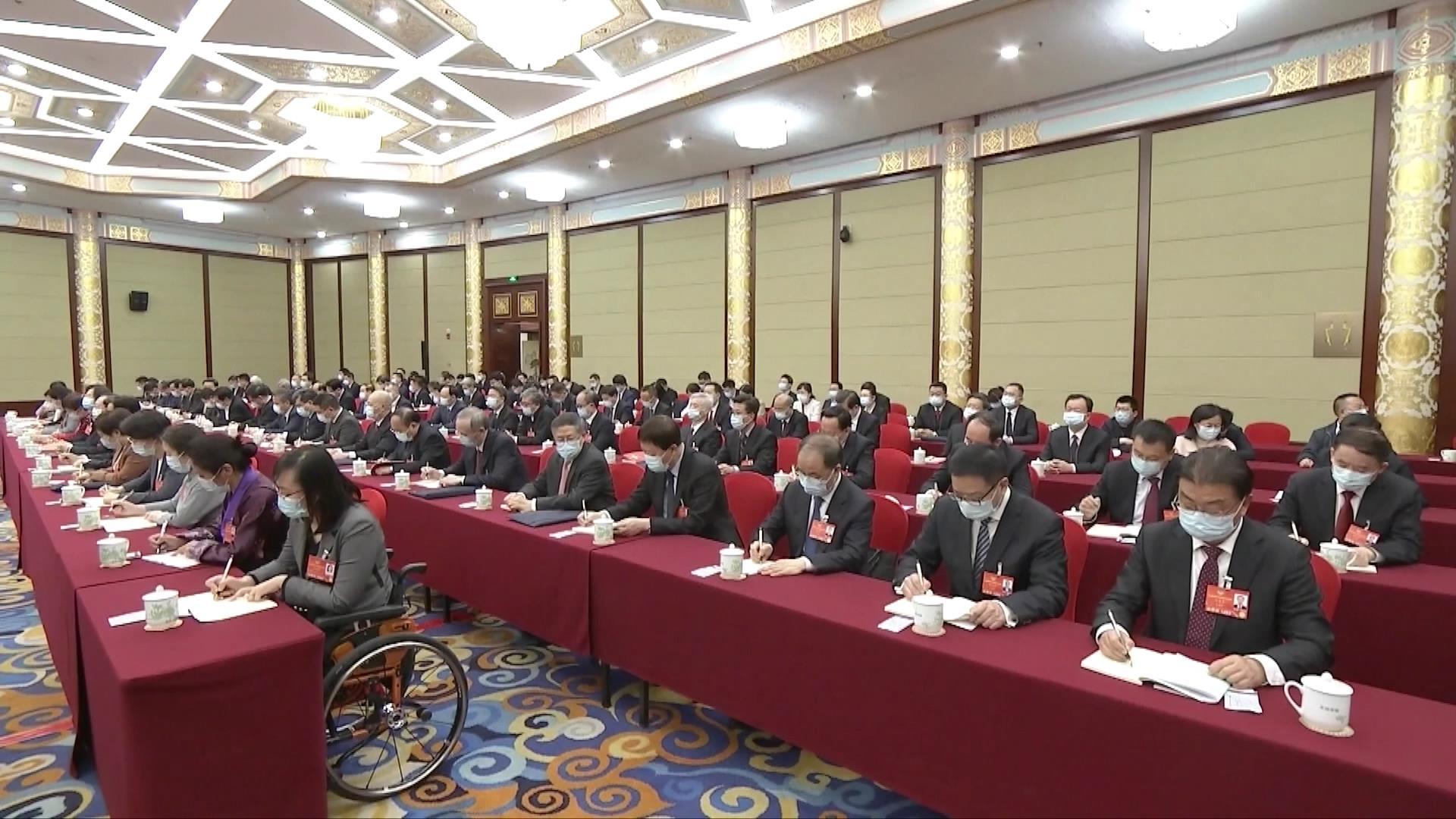 连续第十年参加政协联组会，习近平强调这三个“底”3.jpg
