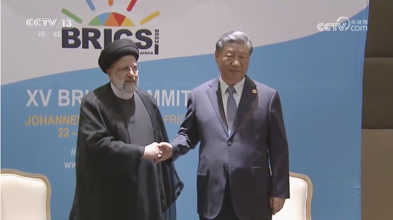 习近平会见伊朗总统.png